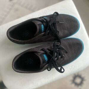 Vans Black High-Tops with Vibrant Blue Highlights